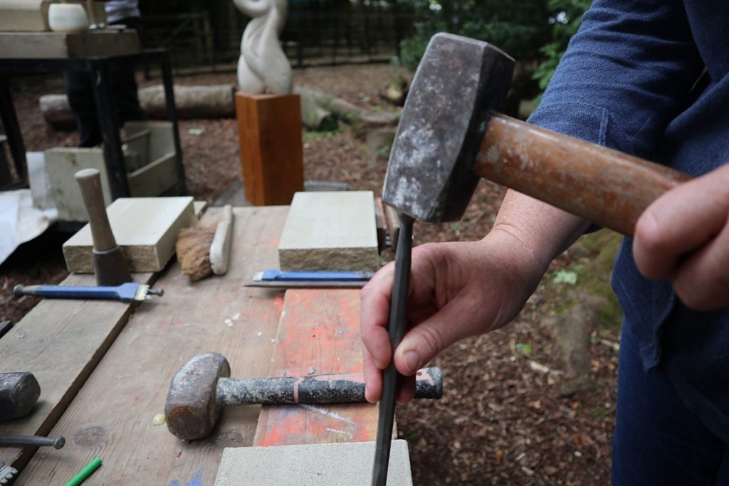 artatthehouse 2021 press release image of stone mason at work